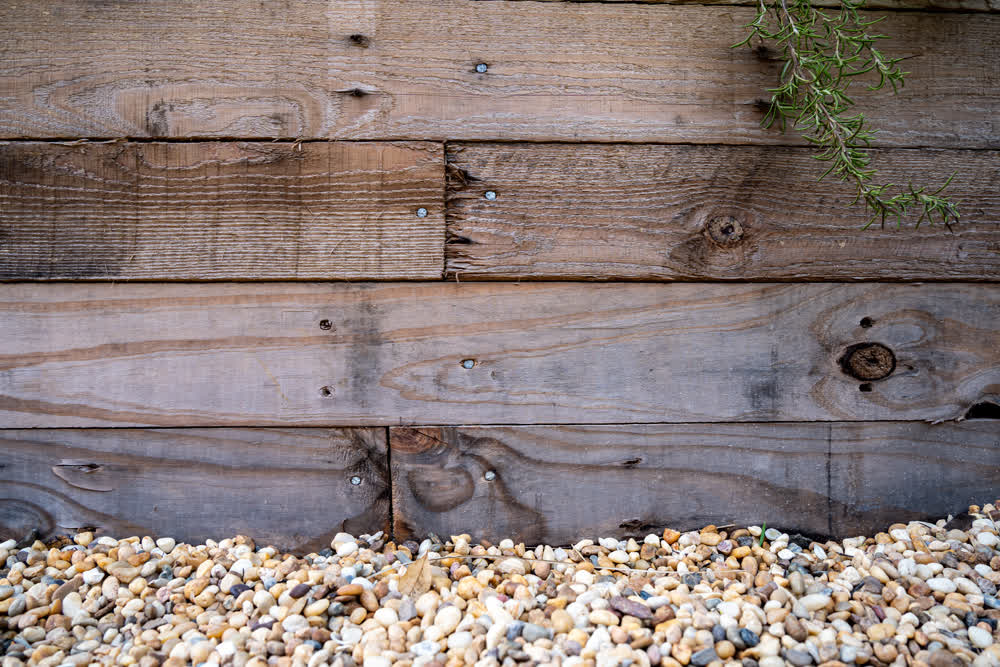 Close-up of timber retaining wall with natural finish